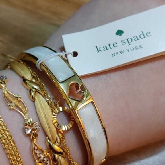 kate spade Jewelry - KATE SPADE BANGLE WITH SPADE CUTOUT & PEARL EFFECT DESIGN